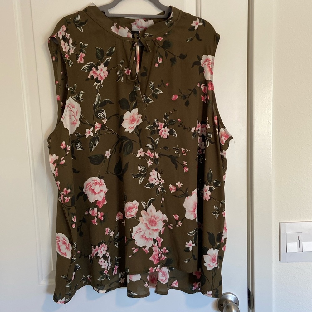Bobeau 3X sleeveless too with a brown background pink, white and green flowers.